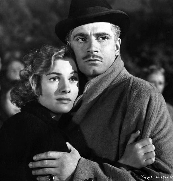 A screen shot of Joan Fontaine and Lawrence Olivier as the heroine and Max in Alfred Hitchcock's Rebecca