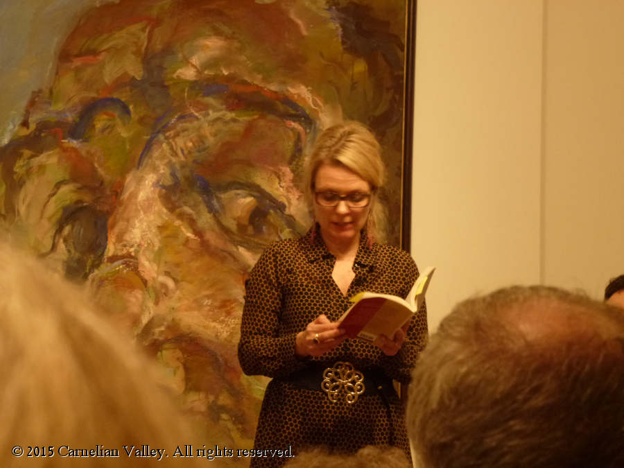 A photograph of Meike Ziervogel reading from her novella